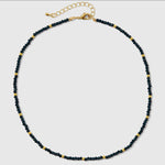 CC CRYSTAL AND GOLD BEAD ACCENT NECKLACE