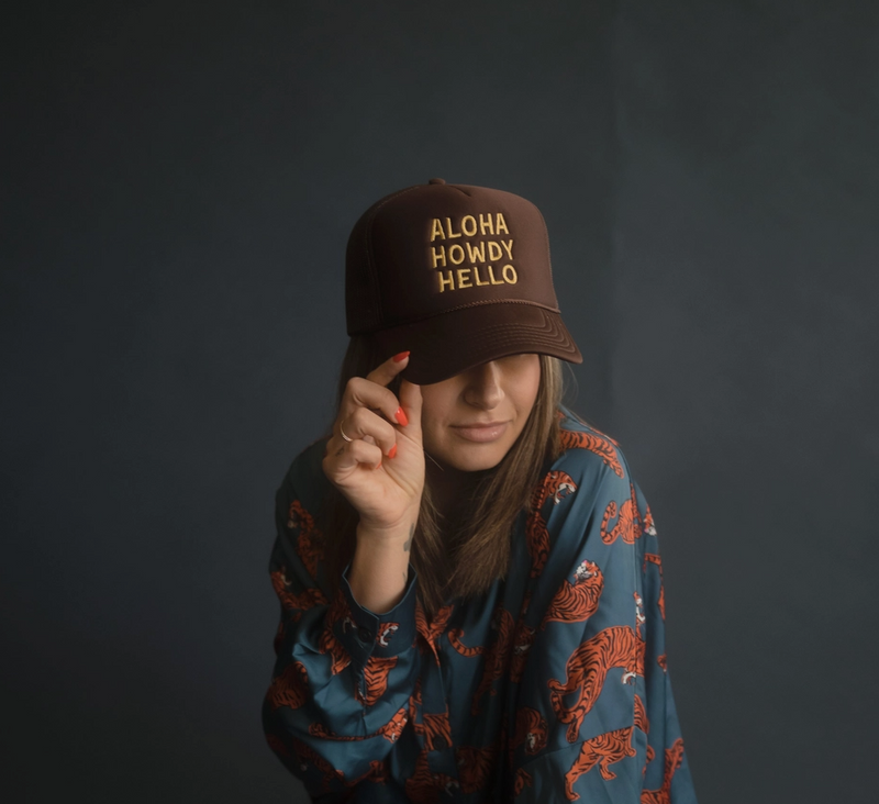 D Aloha Howdy Hello Trucker Hats