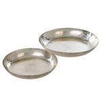 These are hammered trays that are silver shinning metal.  Sizes are - 10"  and  - 12.5".