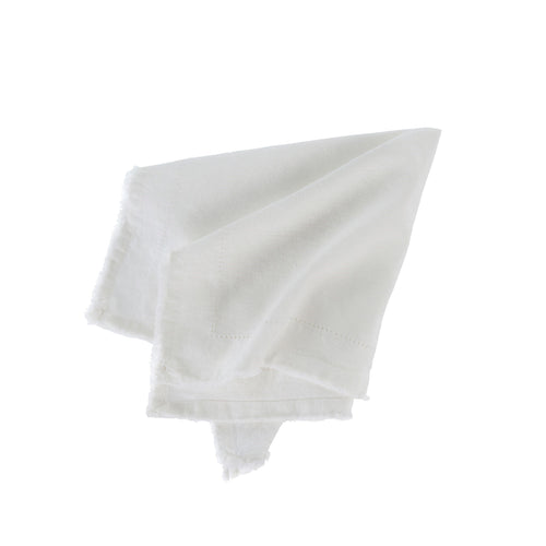 This is s set of 4 white napkins with a hemstitched border and frayed edges. They are made from cotton and linen.