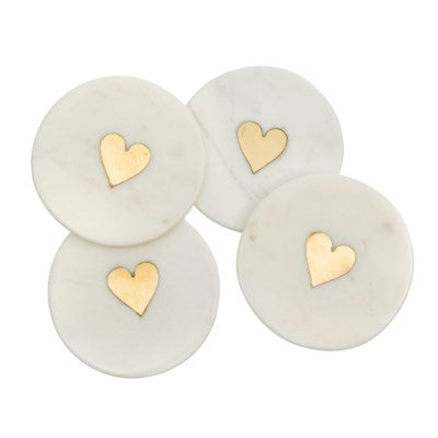 Marble with heart shaped brass inlay.  Size: 4" diameter