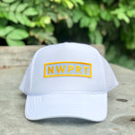 White foam trucker hat with mesh back by NWPRT with a NWPRT patch.