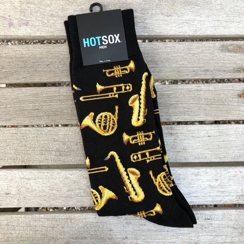 Black socks with brass jazz instruments.