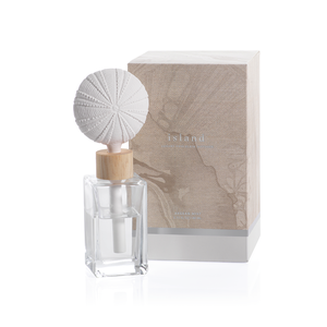 This is a Porcelain diffuser with a Sea Urchin porcelain top.  Size 2.75" wide        7" height  Aegean Mist Fragrance Notes: TOP NOTES: Lemon Zest, Grapefruit, Heliotrope MIDDLE NOTES: Linen Breeze, White Amber, Water Lily BASE NOTES: Sandalwood, Sheer Musk, Orange Flower