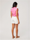 Back view of female model wearing Carve Designs Oahu shorts in cloud (white). Shorts are corduroy with 4" inseam, raw hem bottom, and two back pockets. Paired with pink top.