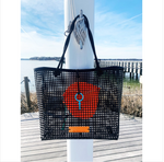 The Everyday Oyster Bag is a large rigid black mesh bag with black rope handles and one blue hook to secure closure. It has an orange internal drawstring pouch. The Everyday sized Oyster bag is approximately 15X15x7 inches.