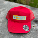 Red canvas hat with mesh back by NWPRT with a NWPRT patch.