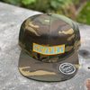 Camo 6-panel hat with snapback canvas back by NWPRT  with a NWPRT patch.
