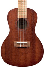 Mahogany dark wood ukulele with white background. 