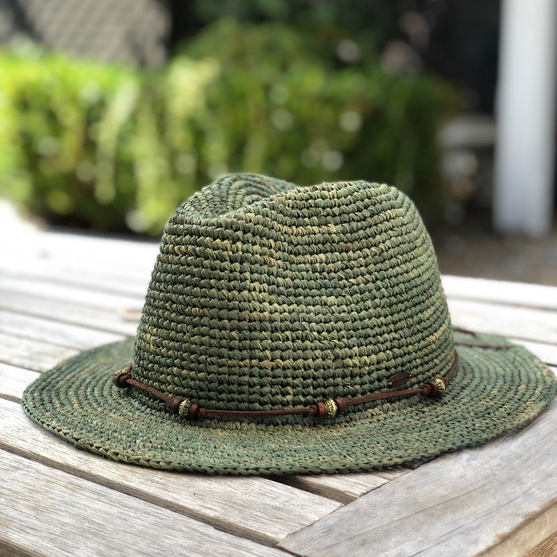 Sunset Safari hat by Kooringal is a raffia woven green hat, with faux suede beaded crown band.