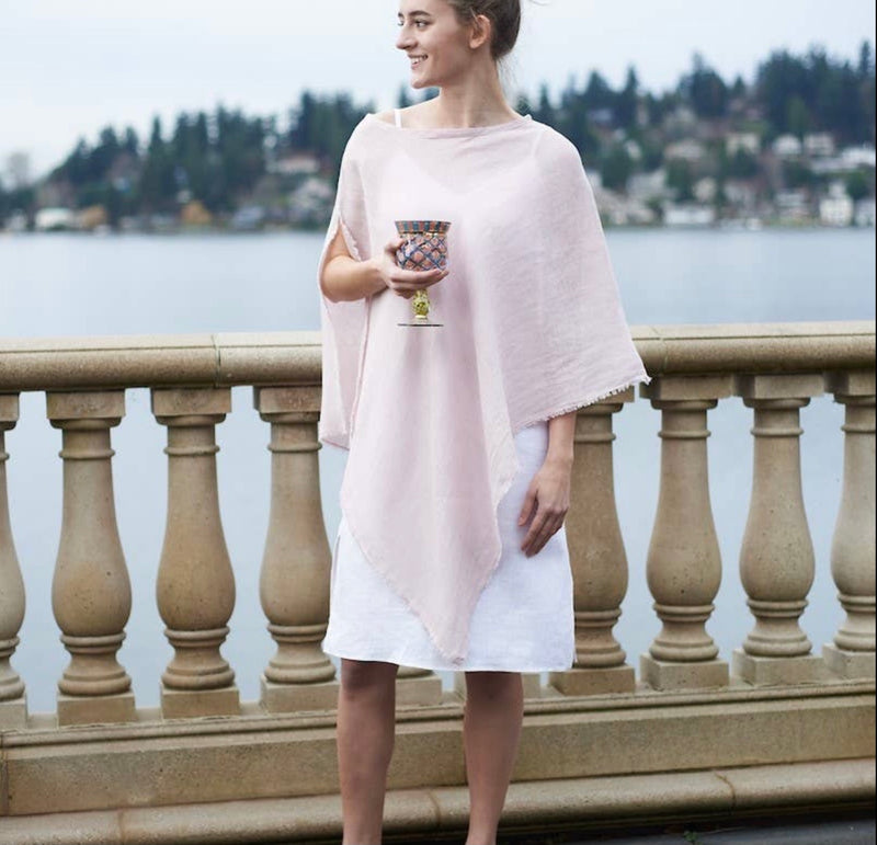 pink linen poncho with fringed edges