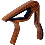Mahogany capo diagonal display with white background. 
