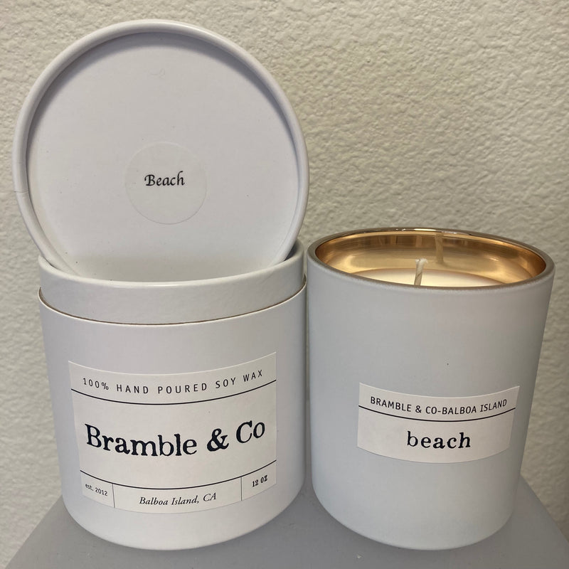 BC white matte tumbler with warm gold interior soy candle