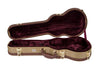 Tweed woven texture ukulele case with shiny brass hardware displayed open with burgundy velvet lining. 